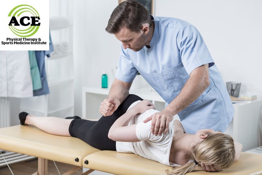 42784428 - physical therapist doing mobilisation of the spine