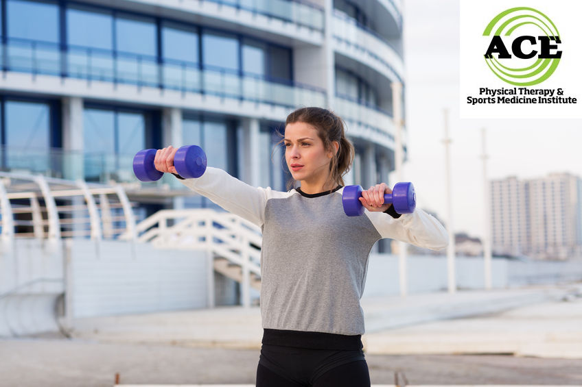 52759568 - sportive young woman working out outside in a big city